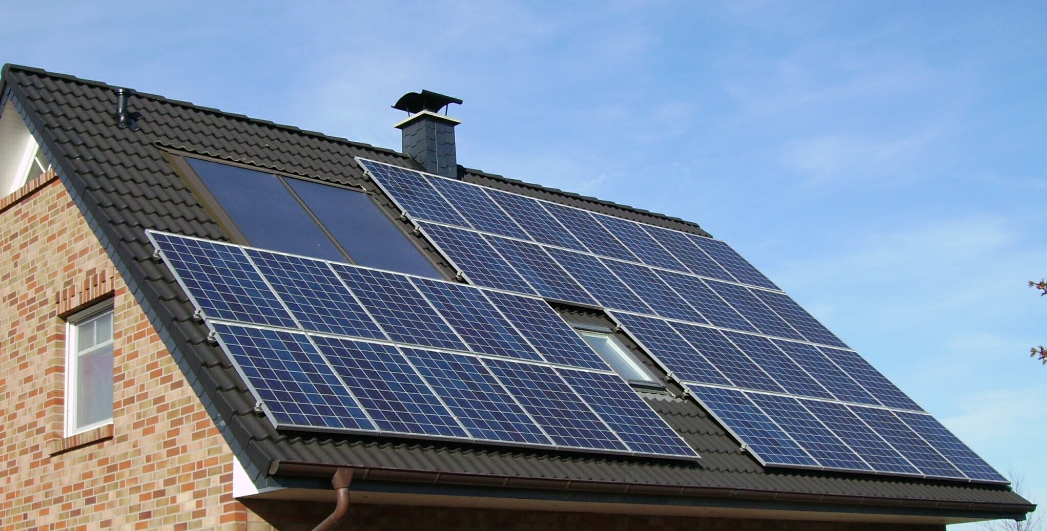 Solar photo-voltaic panels on a roof